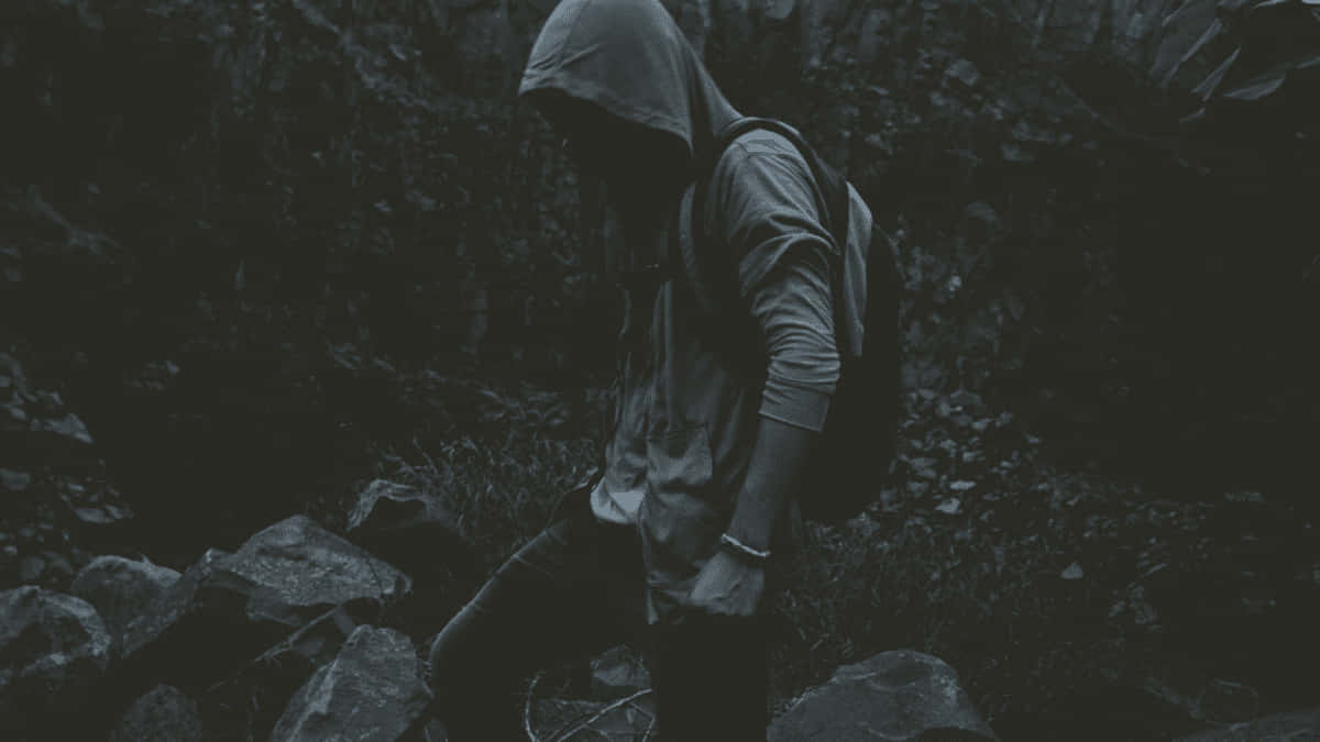 Vindictive Man In A Hoodie Background