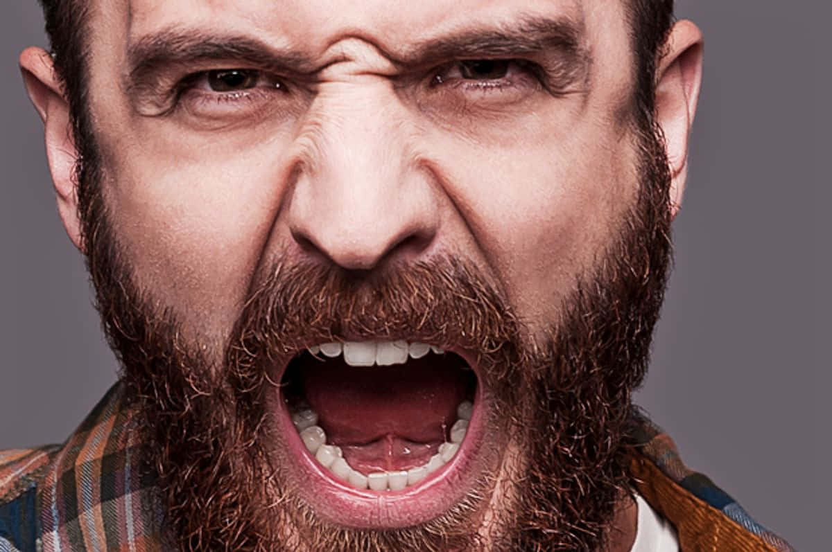 Vindictive Man With Beard Background