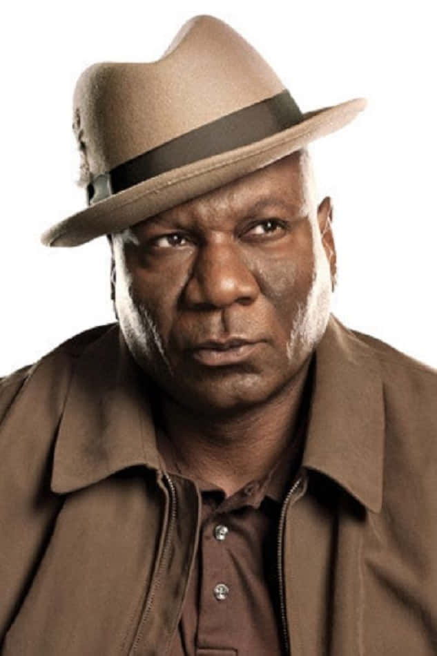 Ving Rhames Confidently Posing For A Photo Shoot Background