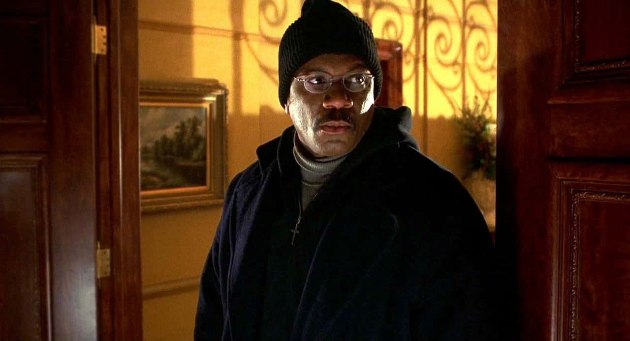 Ving Rhames Posing For A Photo Background