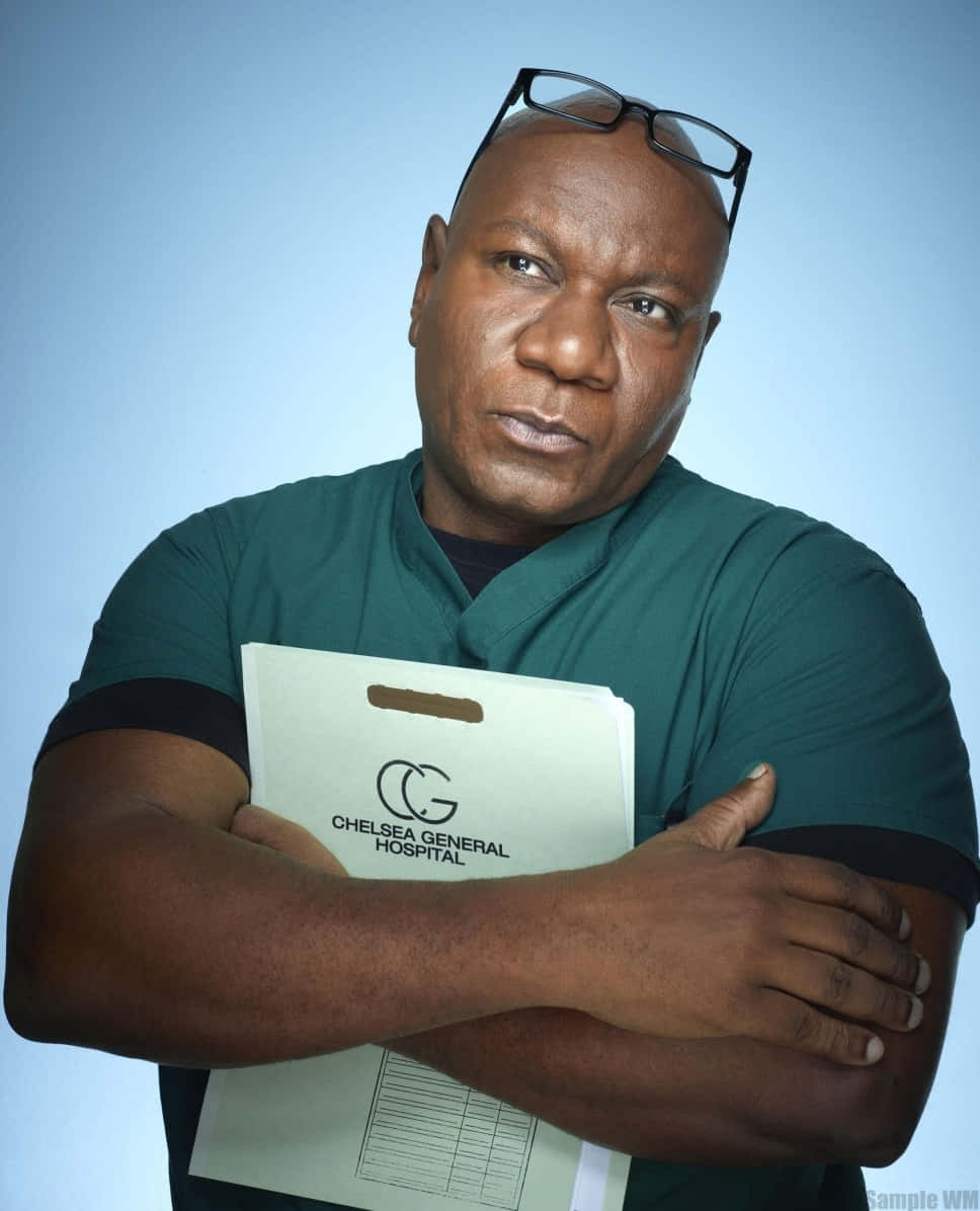Ving Rhames Striking A Confident Pose In A Stylish Outfit Background