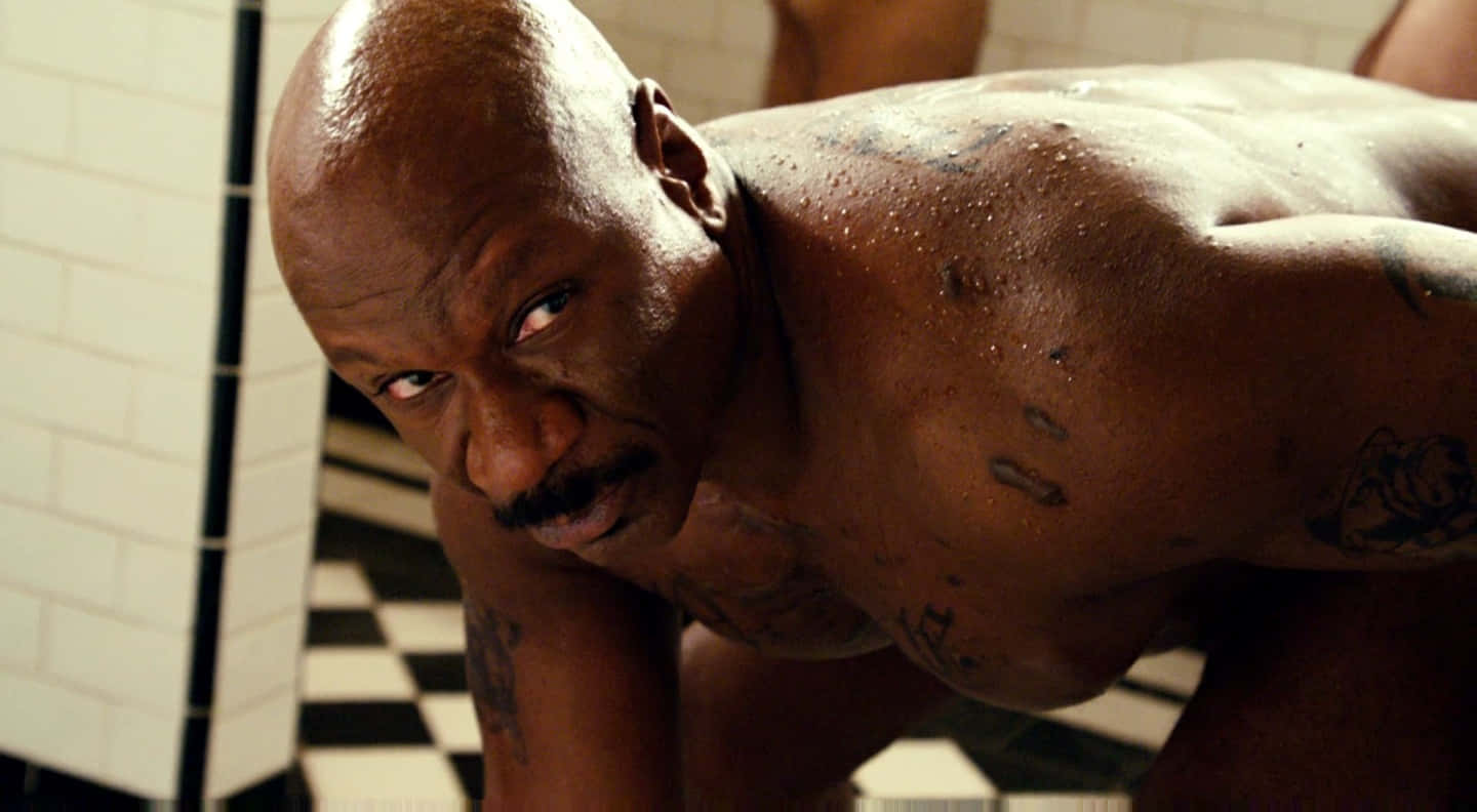 Ving Rhames Striking A Pose During A Photoshoot Background