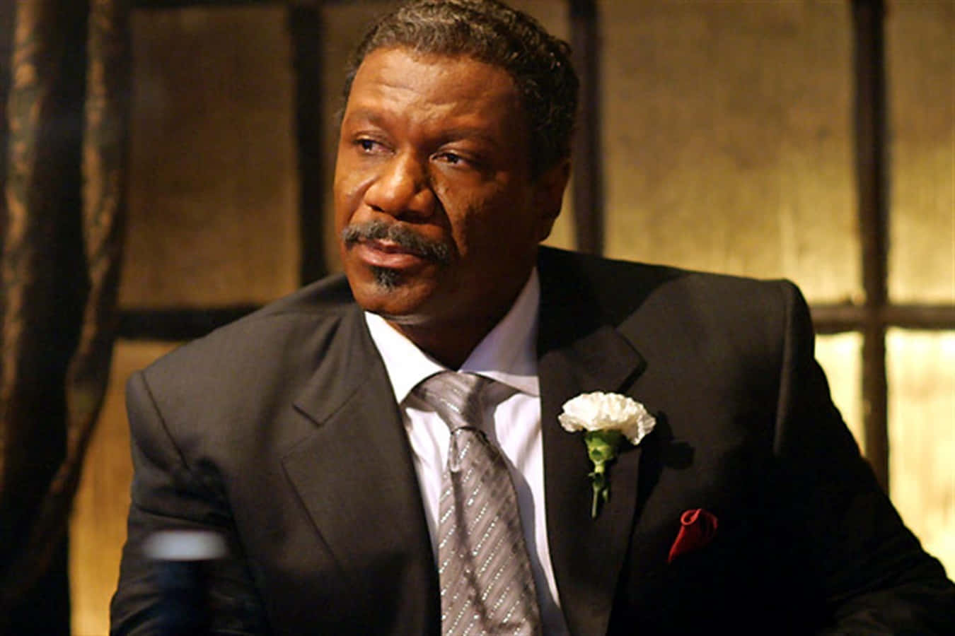 Ving Rhames Striking A Pose With A Smolder On His Face Background