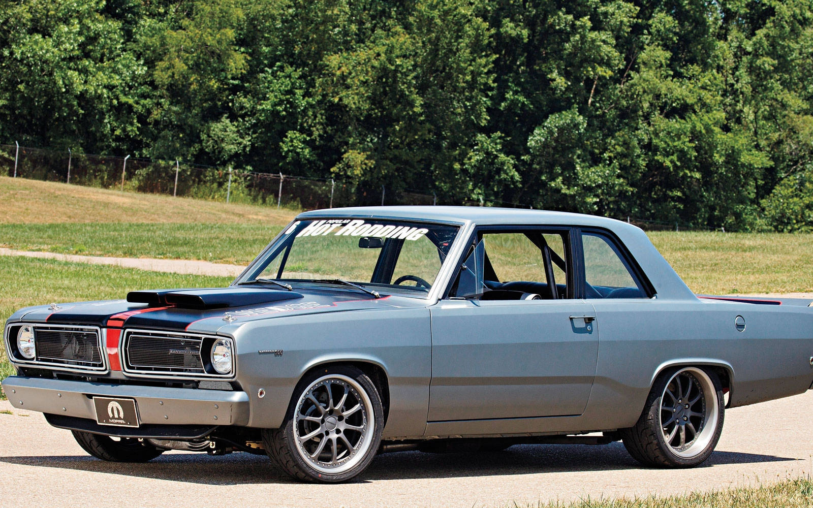 Vintage 1968 Plymouth Valiant In Elegant Gray Background