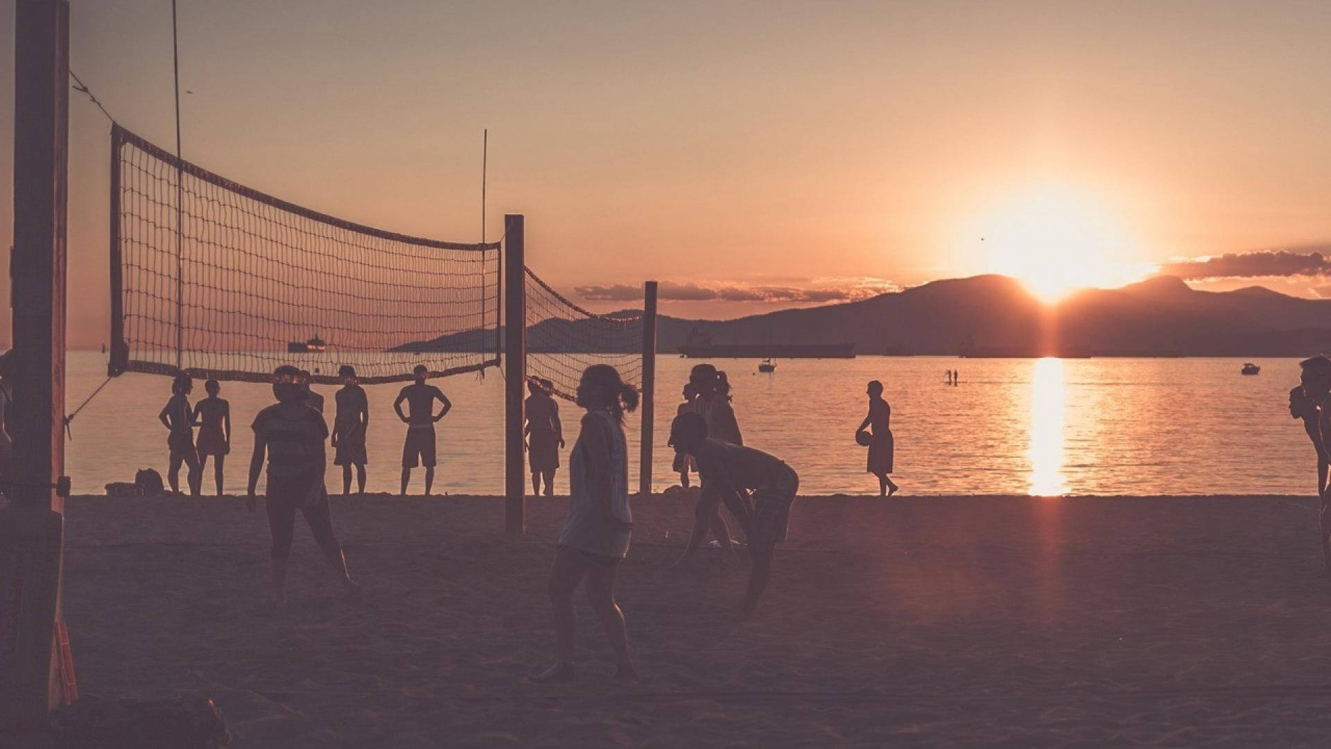 Vintage Beach Volleyball At Sunset Shot Background