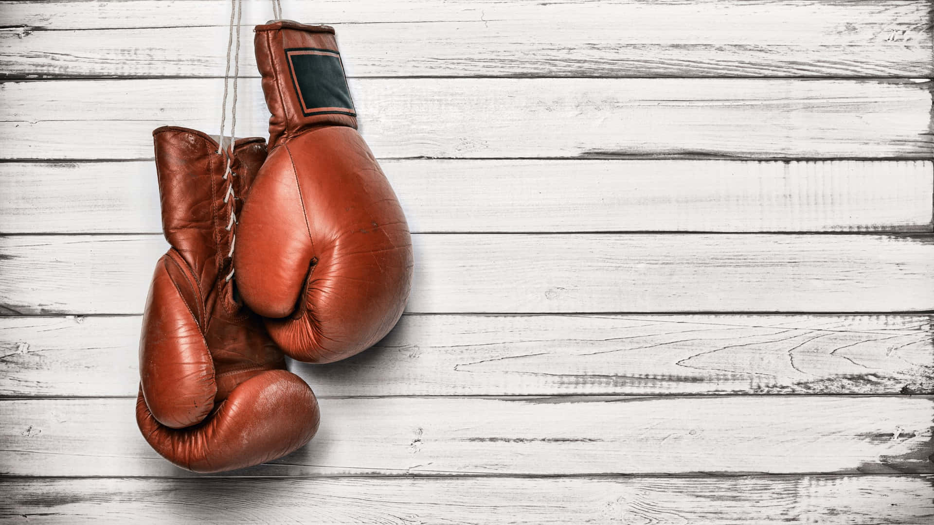Vintage Boxing Gloveson Wooden Background Background