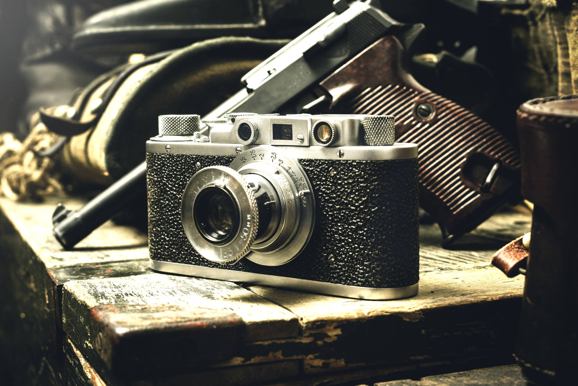 Vintage Camera And Gun Background