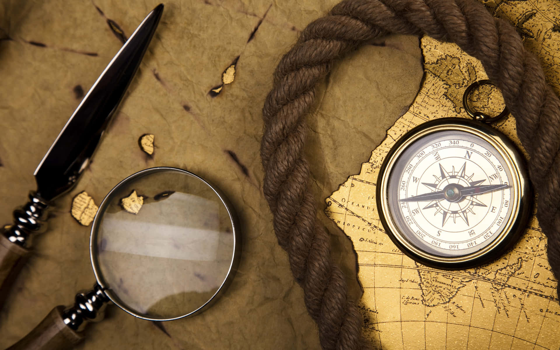 Vintage Compass And Magnifying Glass Background