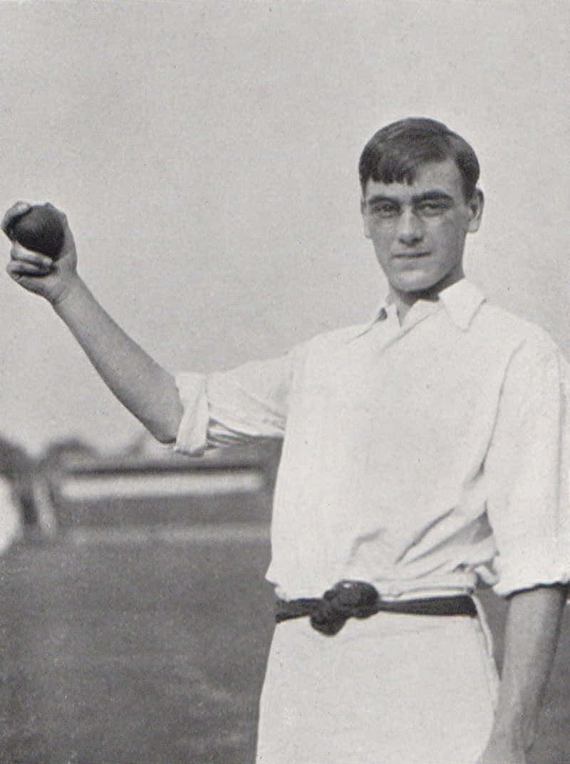 Vintage Cricket Bowler Pose Background