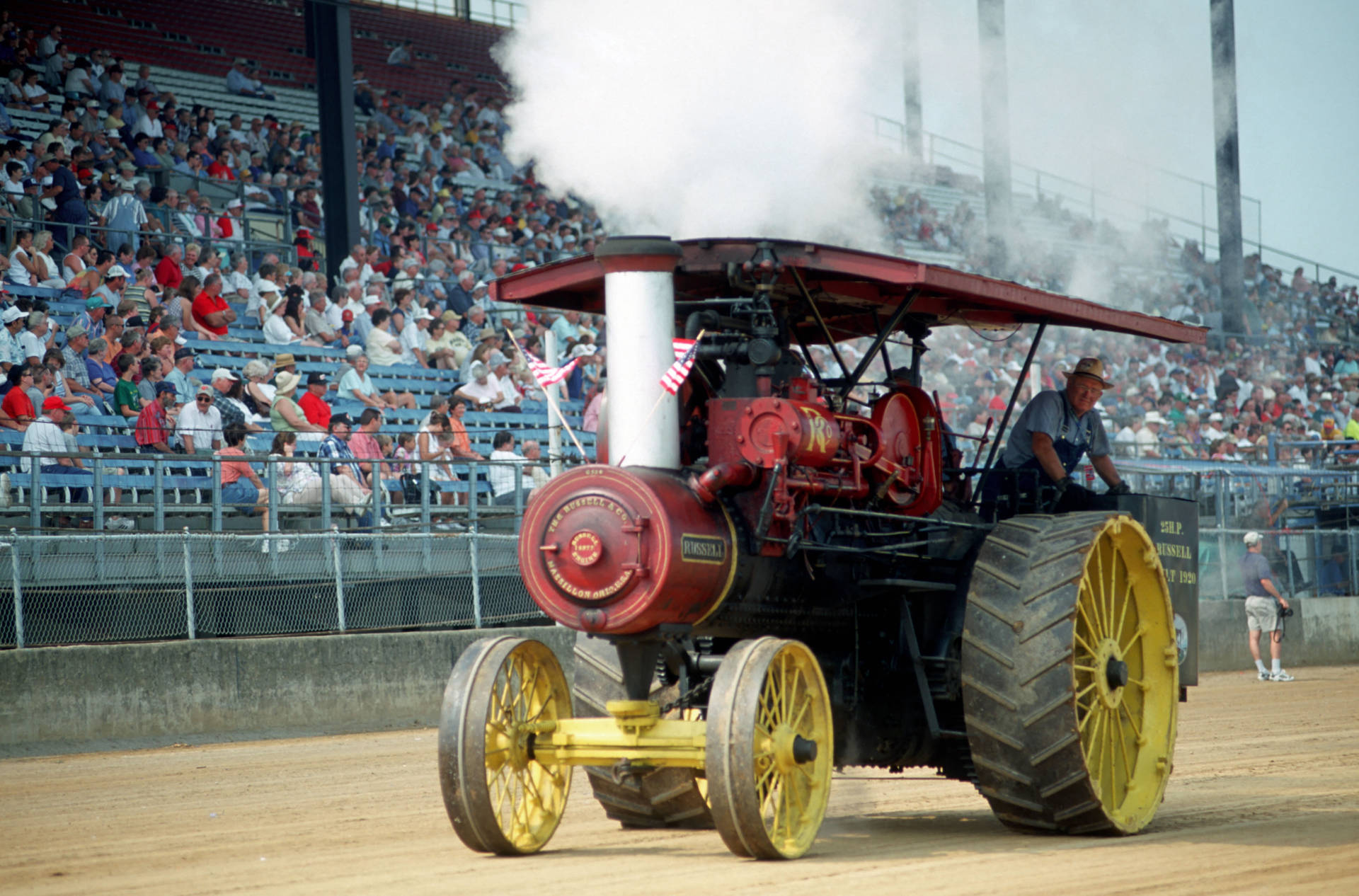 Vintage Elegance - A Restored Tractor At A Show Background