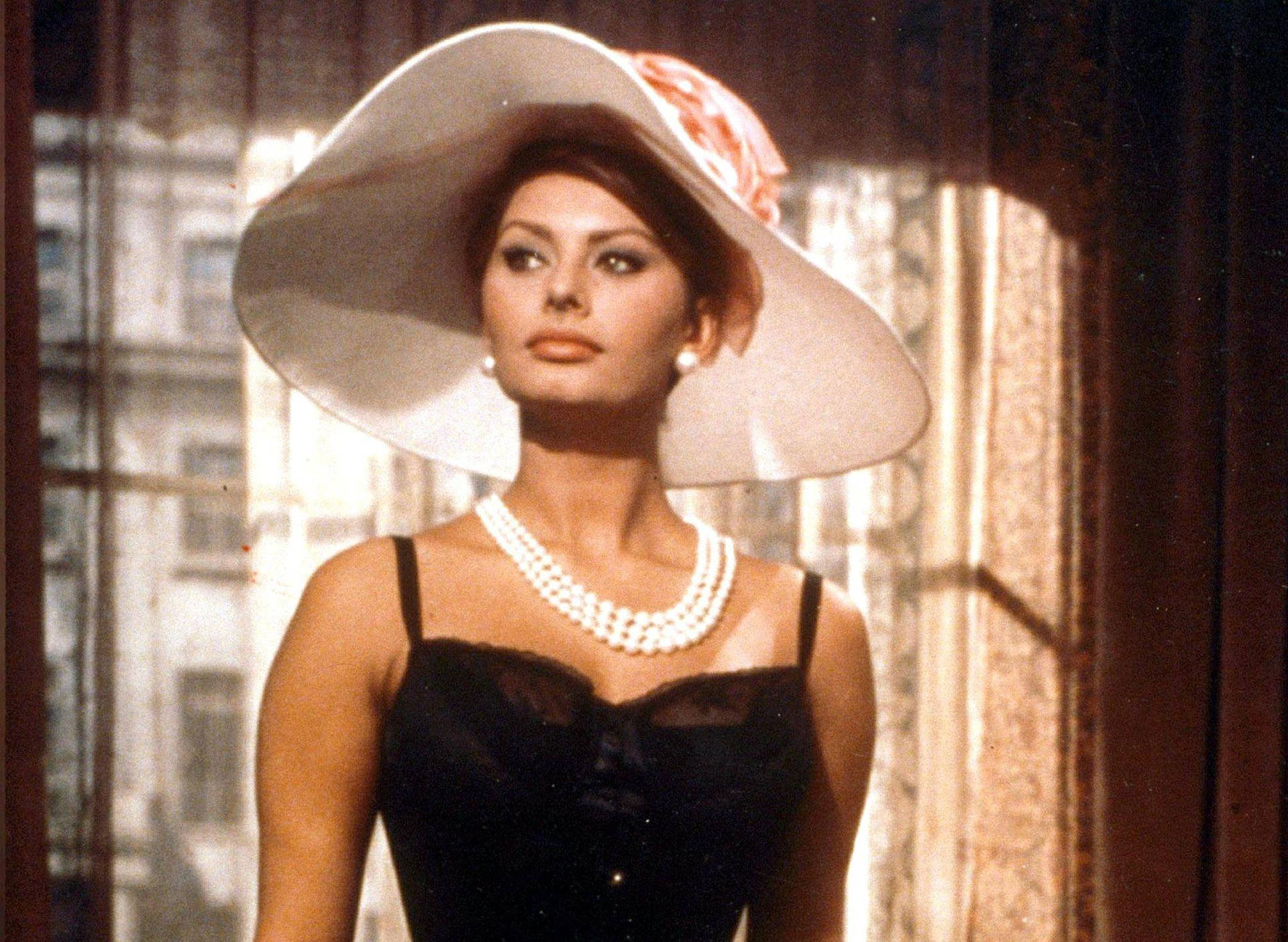 Vintage Elegance: Sophia Loren In The Millionairess Background