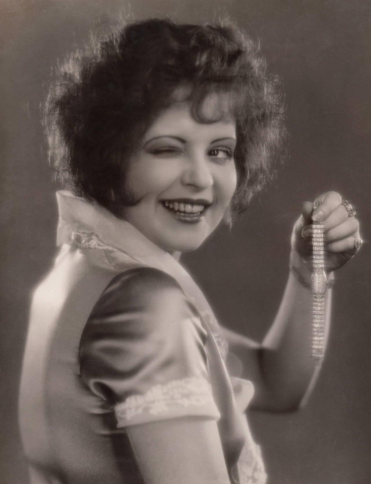 Vintage Hollywood Star - Clara Bow Winking Background