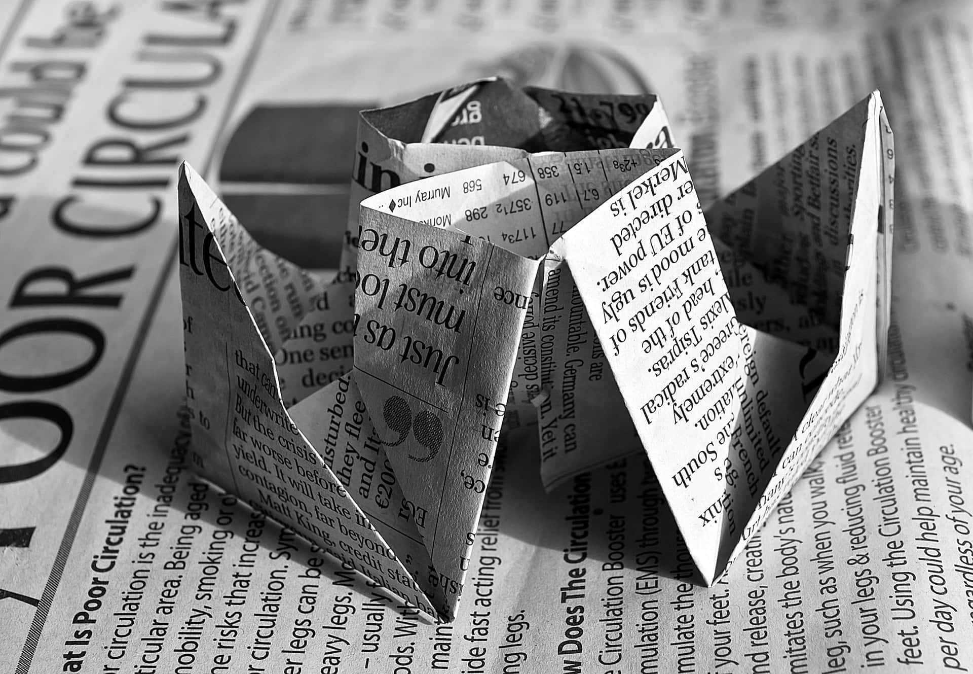 Vintage Newspaper Used As Origami Background