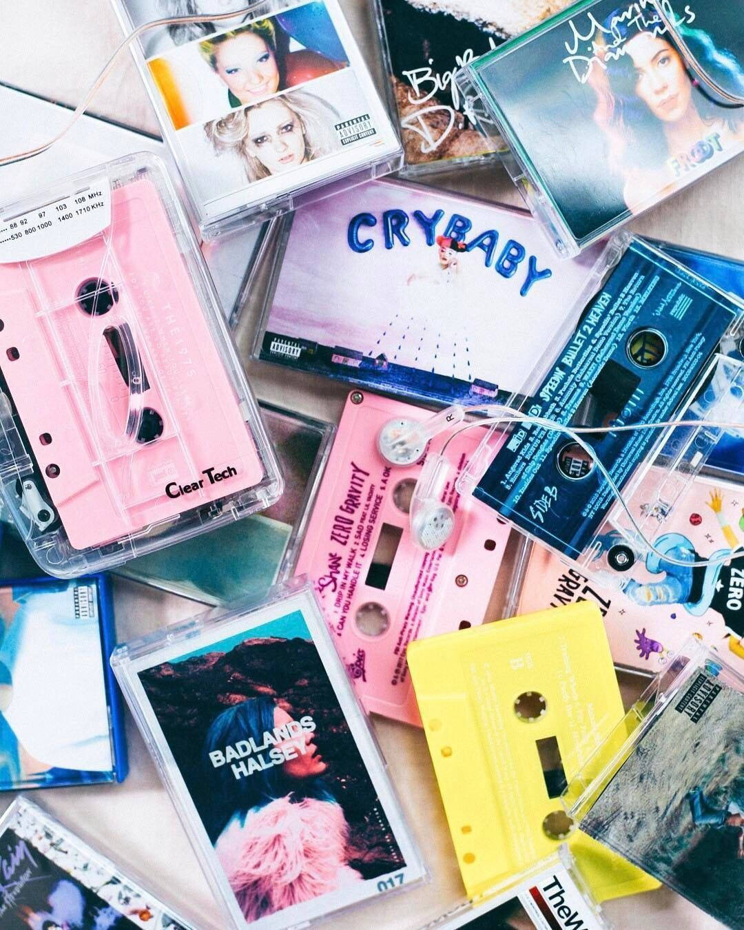 Vintage Pastel Cassette Tapes Pile Background