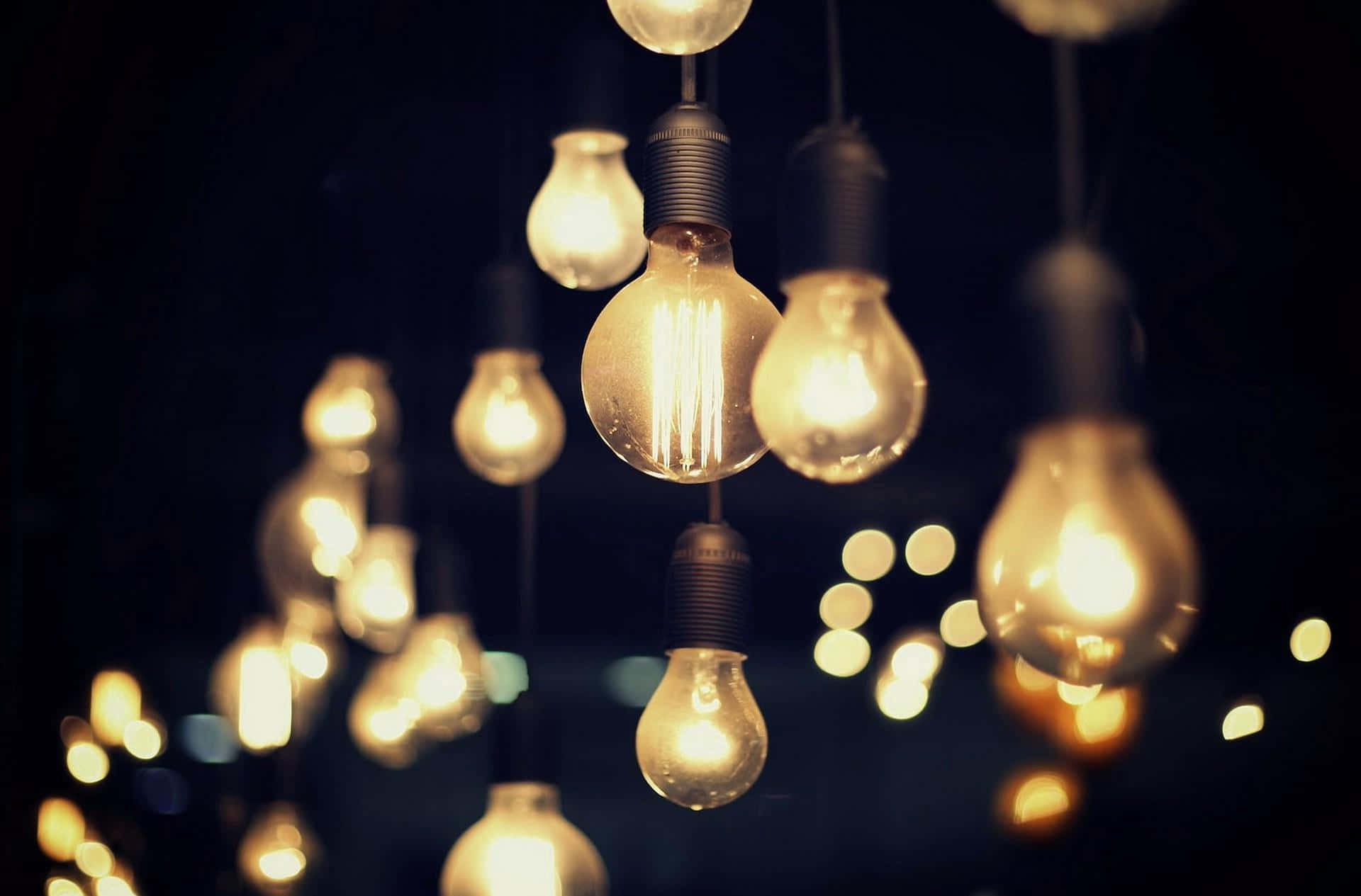 Vintage Pendant Lights Glowing Bokeh Background