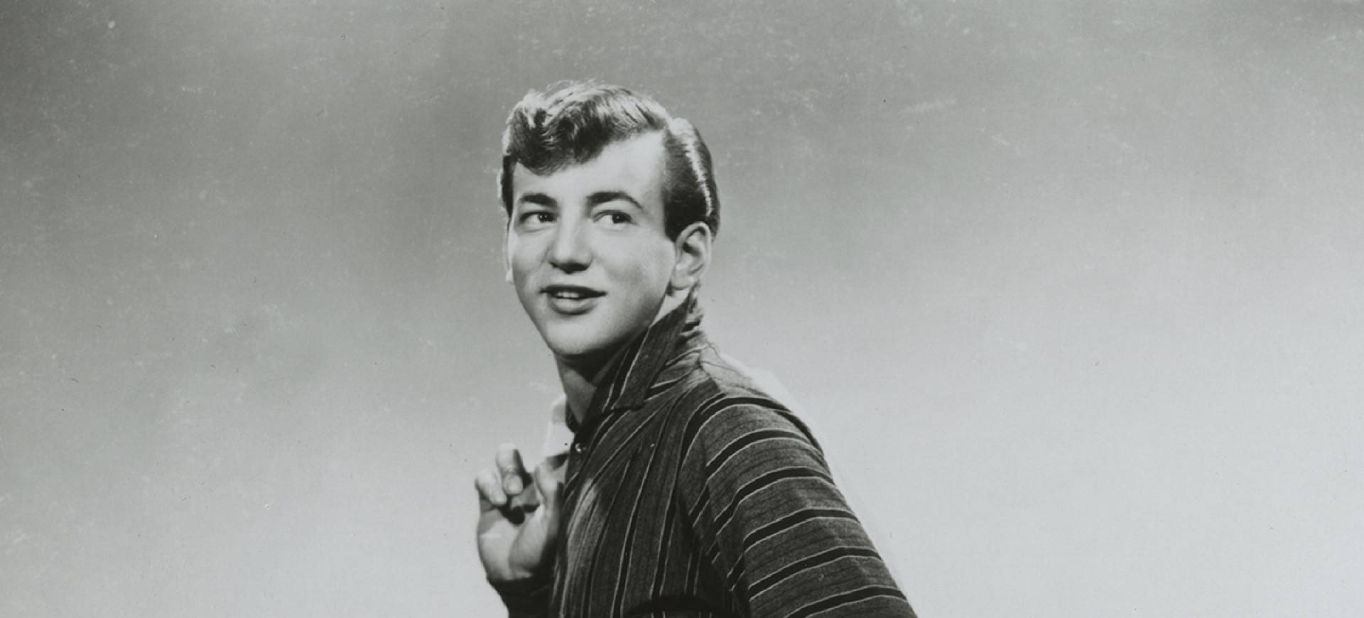 Vintage Portrait Of American Singer Bobby Darin Background