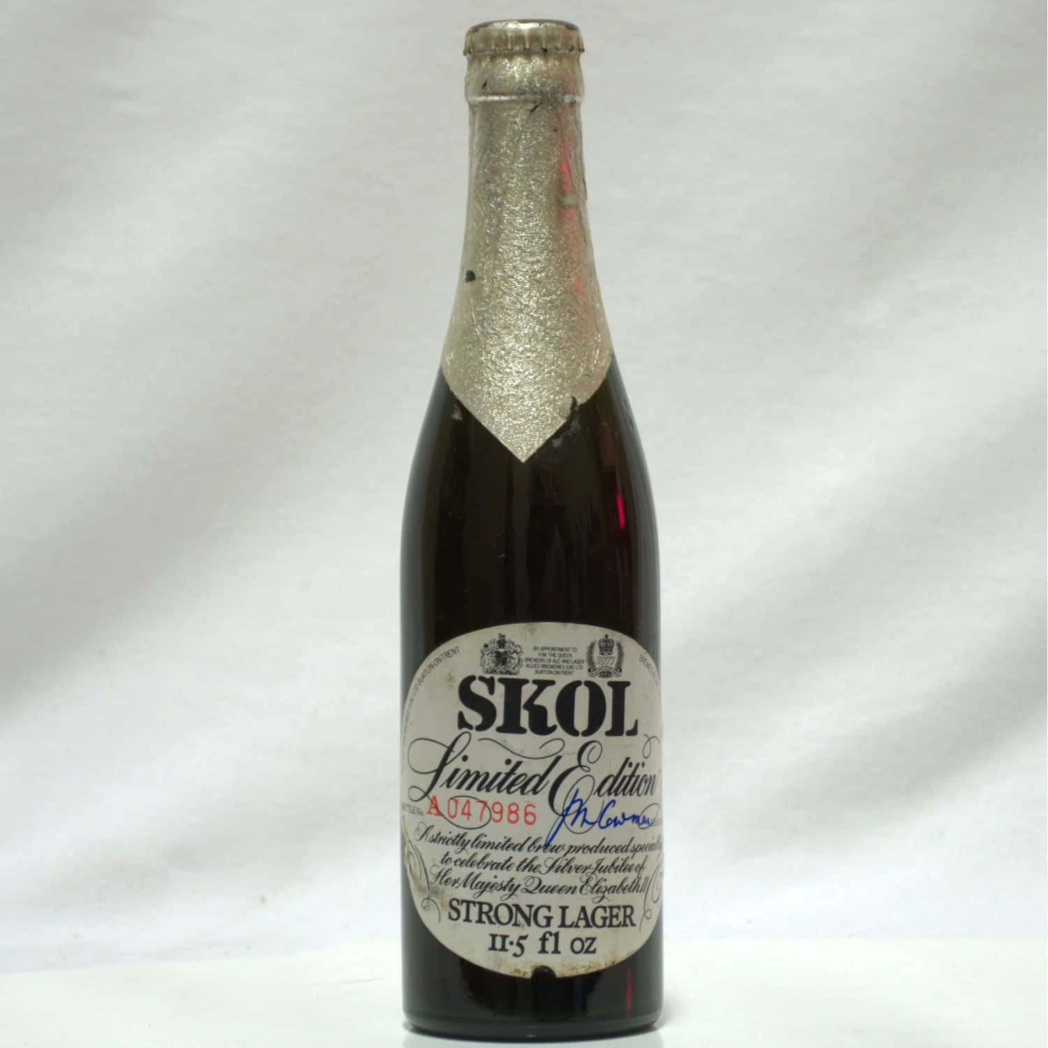 Vintage Skol Strong Lager Bottle Background