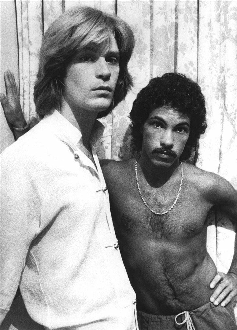 Vintage Snapshot Of Iconic Pop-rock Duo Daryl Hall And John Oates Background