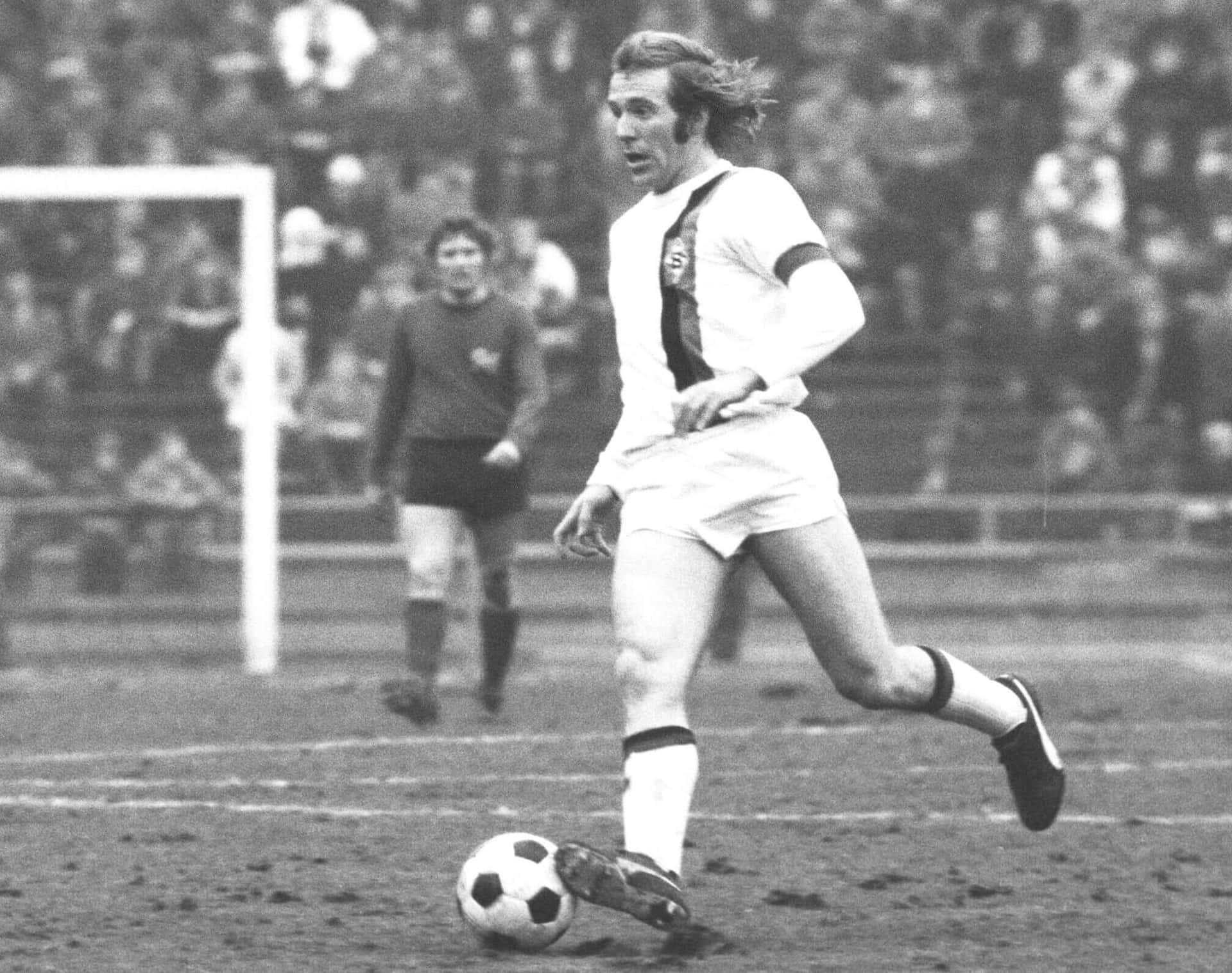 Vintage Soccer Player Action Shot Background