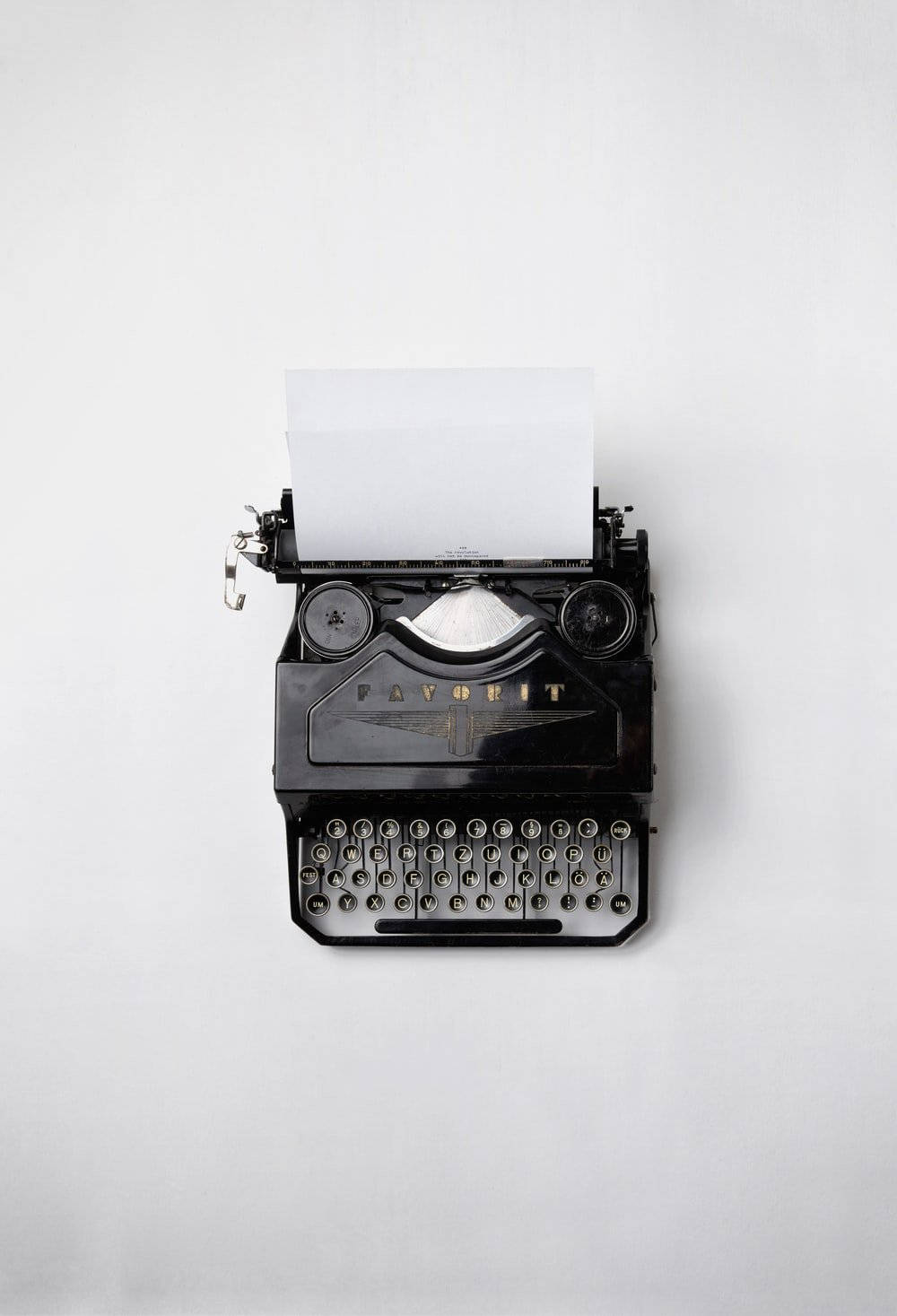 Vintage Typewriter On A Desk Background