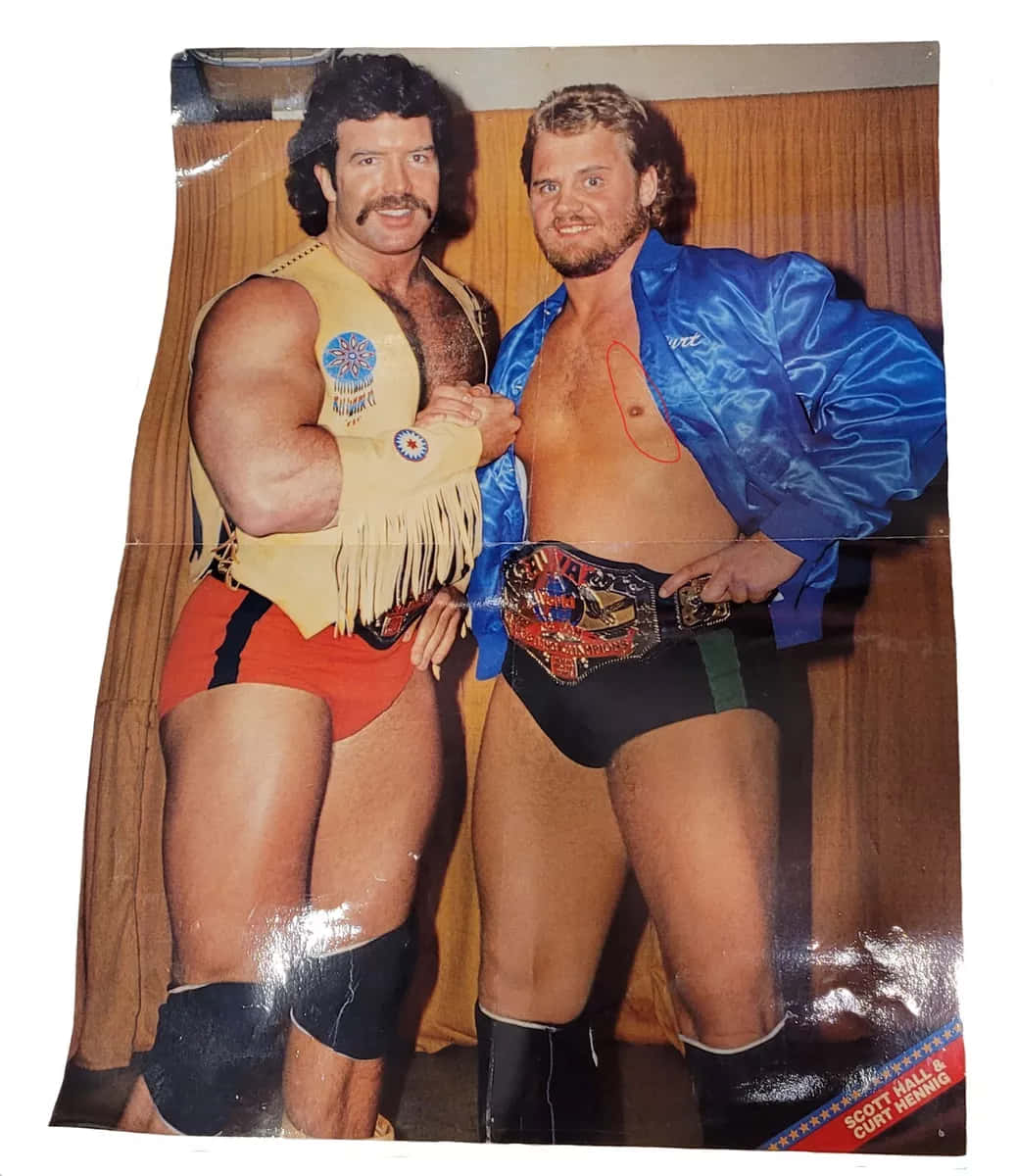 Vintage Wrestlers Pose With Championship Belt Background