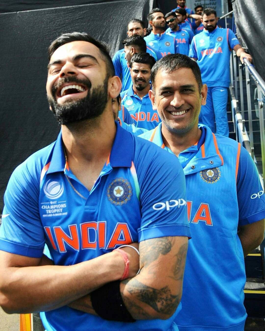 Virat_ Kohli_and_ M S_ Dhoni_ Laughing Background