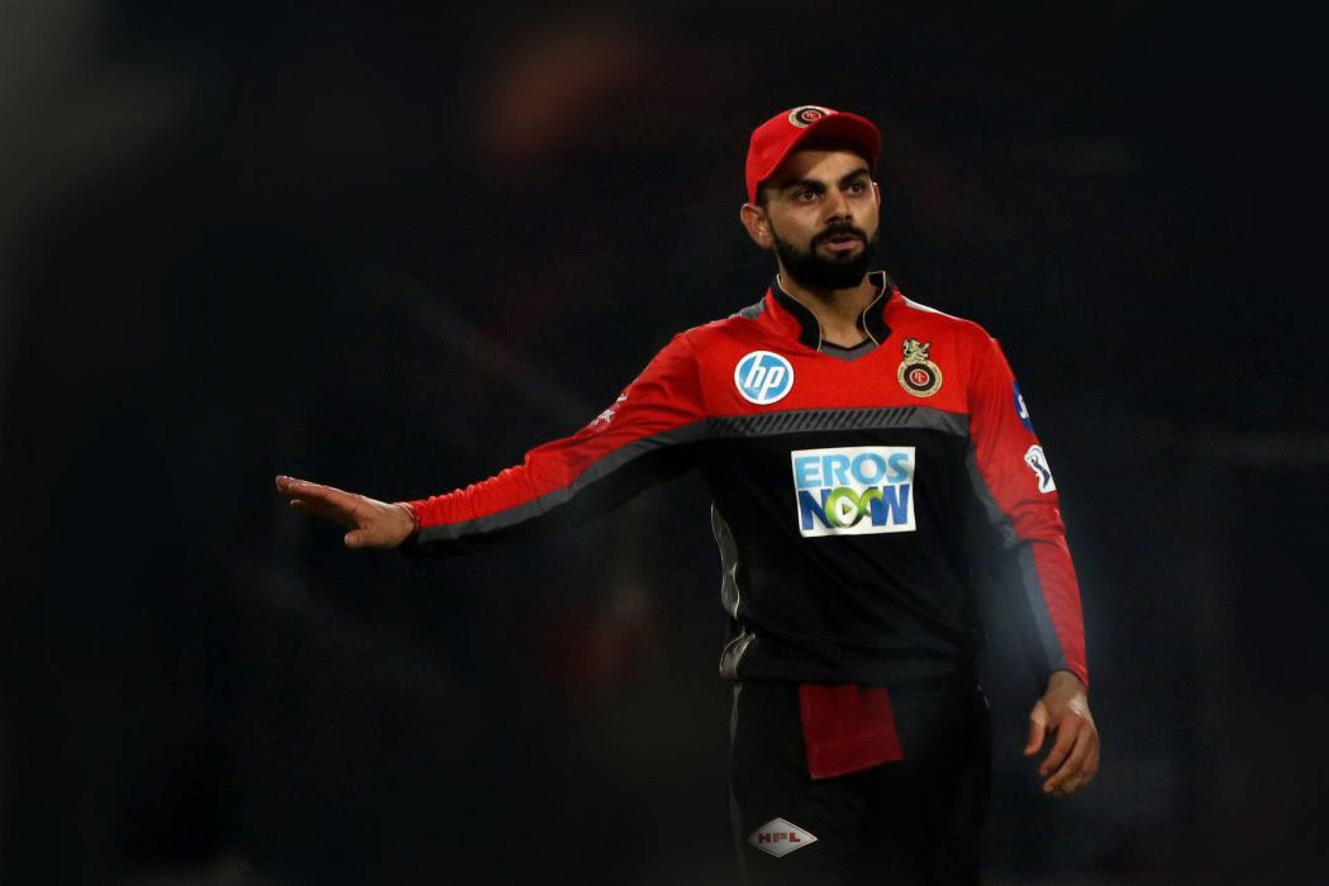 Virat Kohli Rcb In Red Cap Background