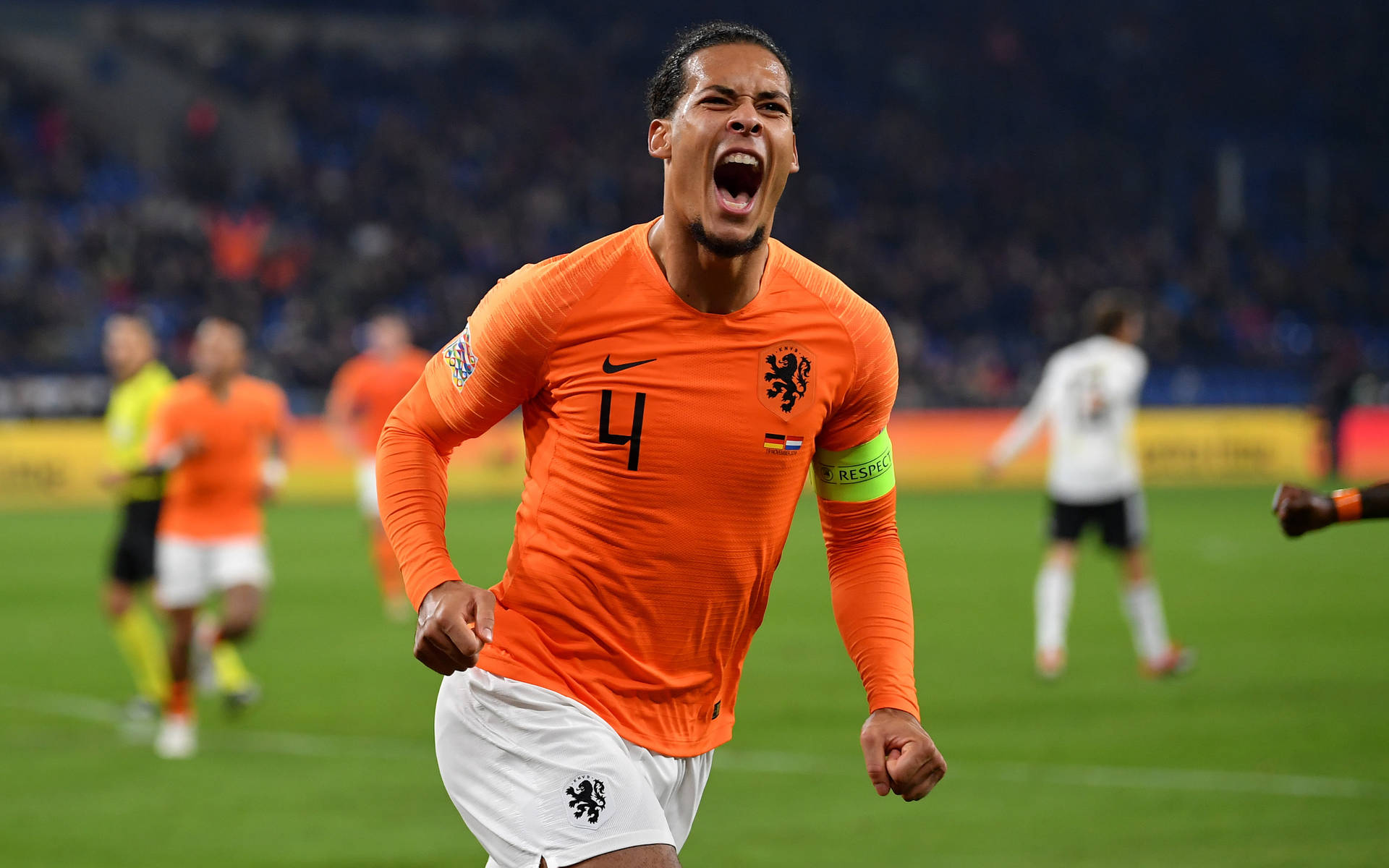 Virgil Van Dijk In Orange Jersey Background