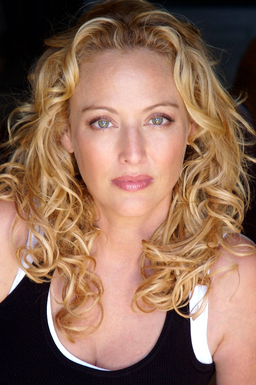 Virginia Madsen Fantastic Golden Curls Background