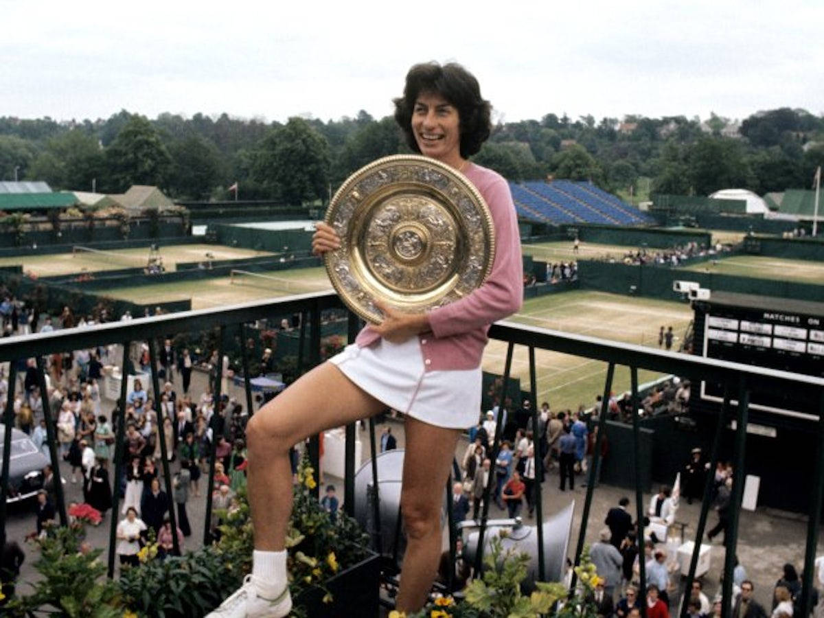 Virginia Wade Holding Trophy Game Background