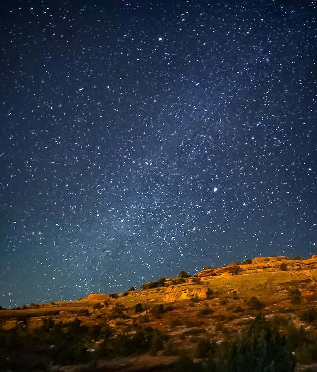 Visible Stars Over Mountainside