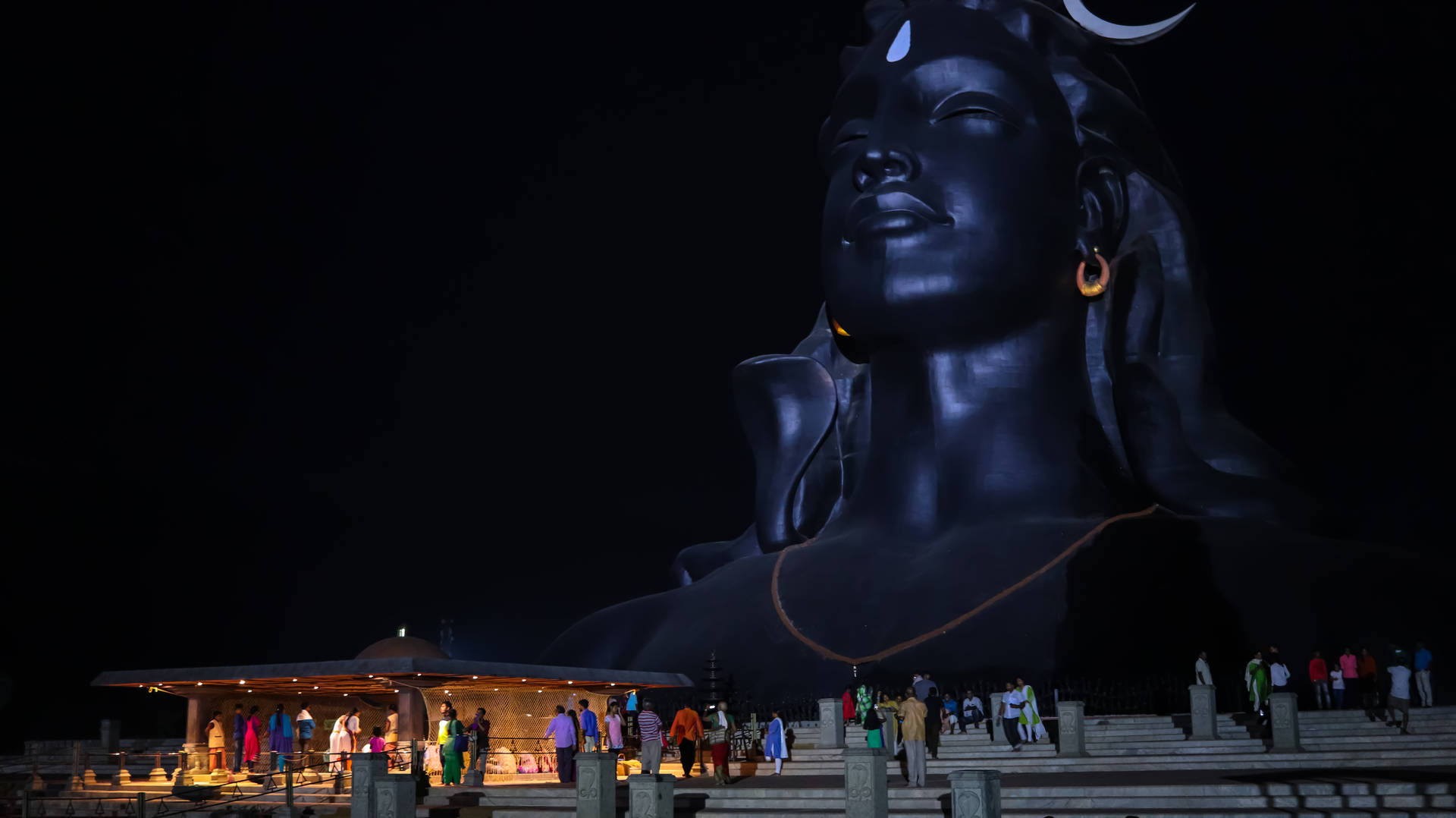 Visitors Of Adiyogi Shiva Statue Nighttime Background