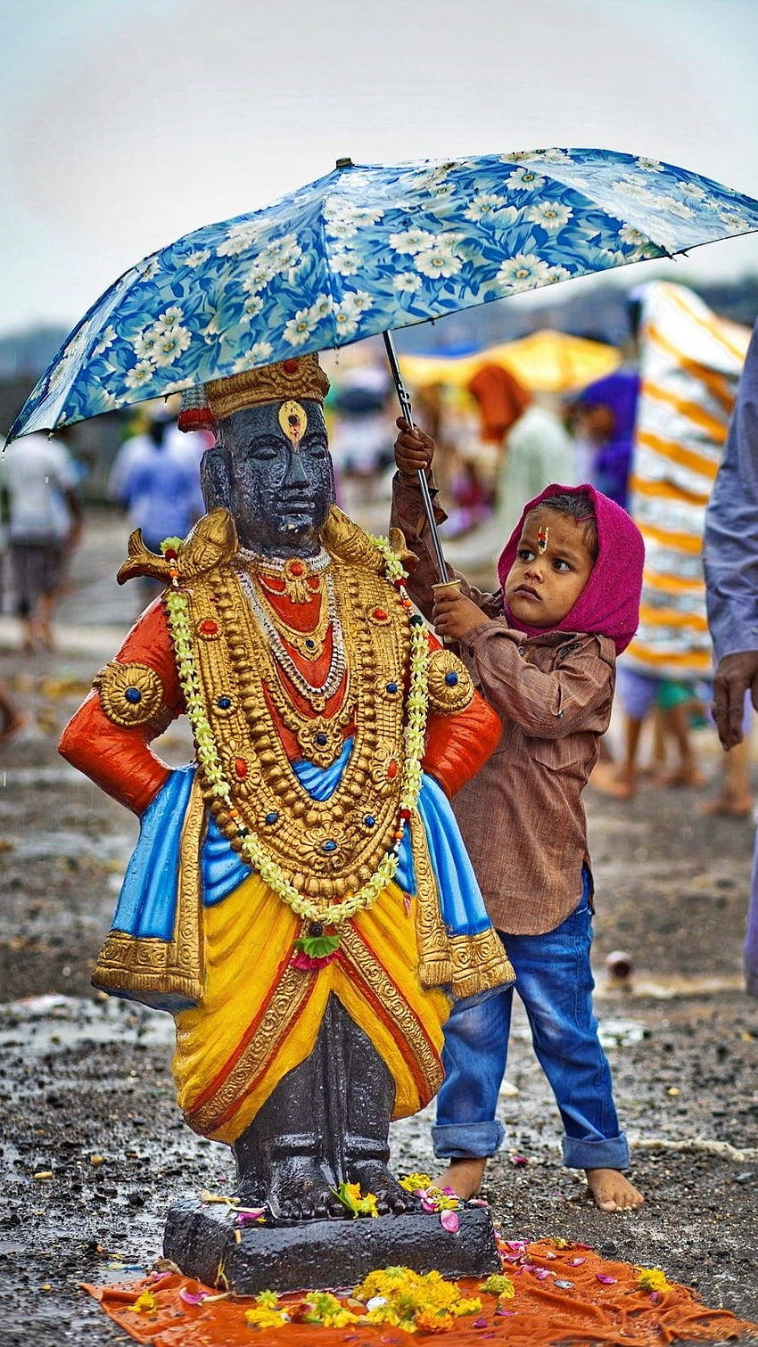Vithu Mauli Divine Statue With Child Background