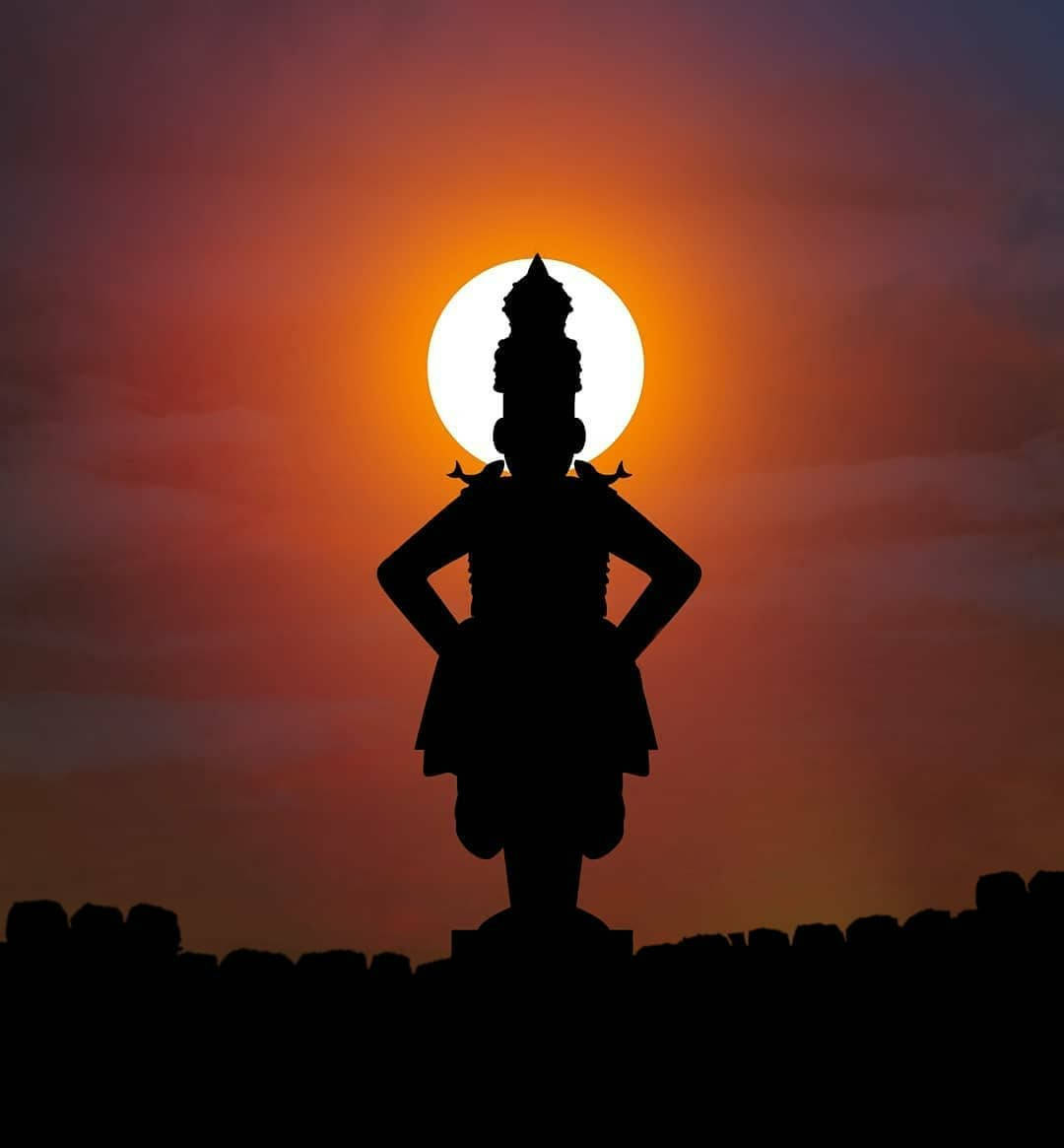 Vithu Mauli Silhouetted By Sun Background