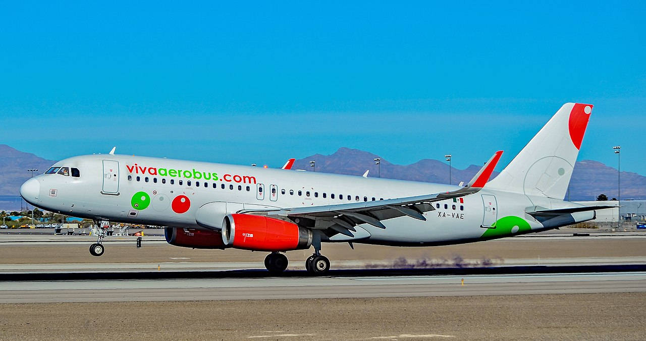 Viva Aerobus On Airport At Morning Background