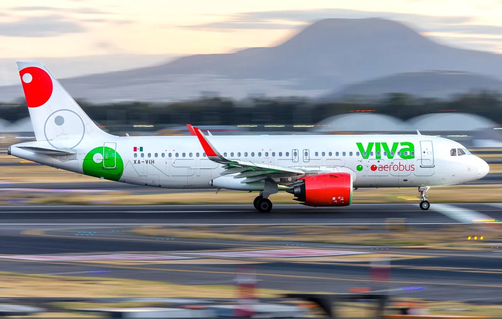 Viva Aerobus On Airport Blurred Effect Background