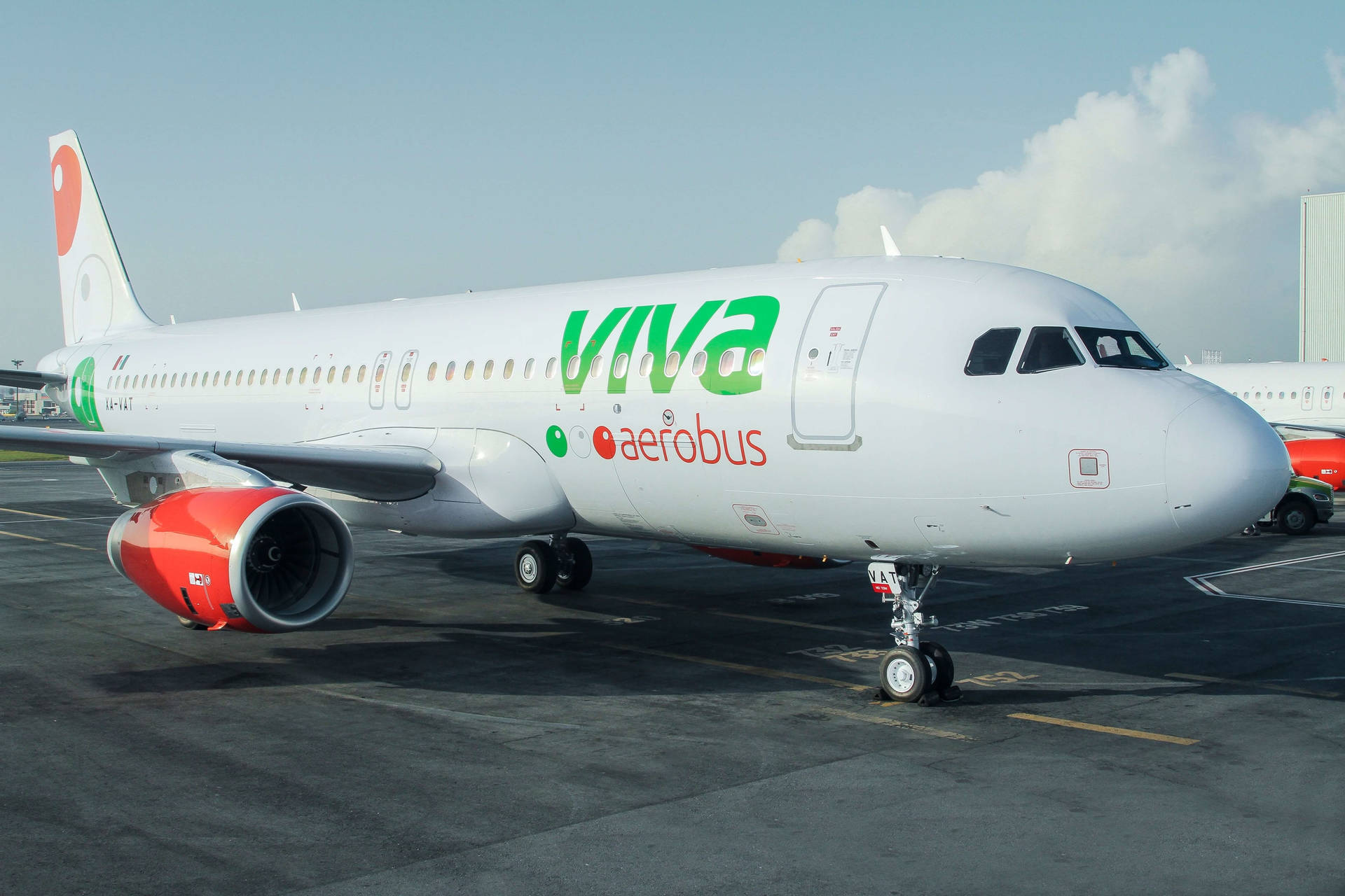 Viva Aerobus On Tarmac Runway Background