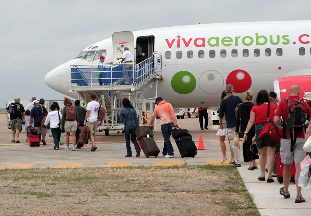 Viva Aerobus Passengers Entering Plane Background