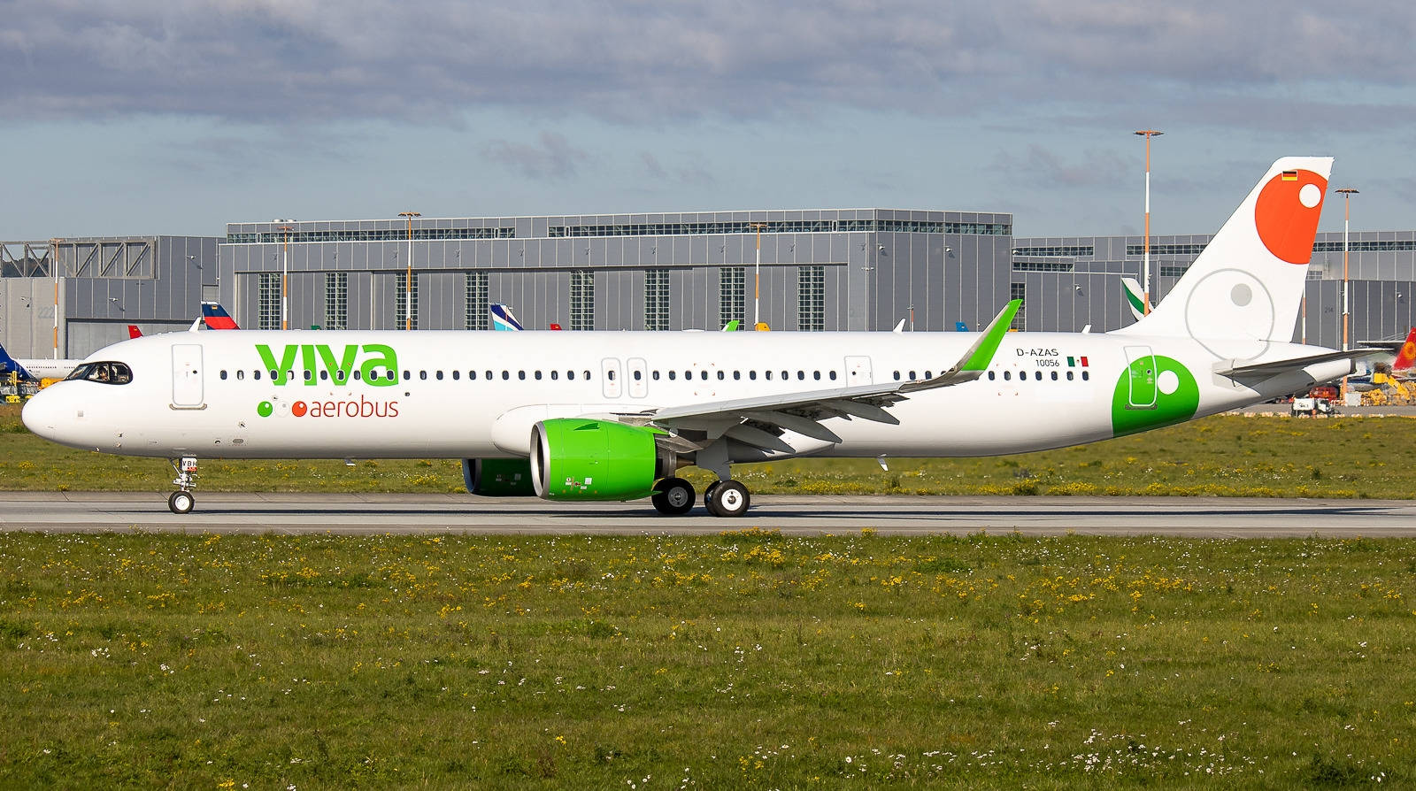 Viva Aerobus With Gray Building Background