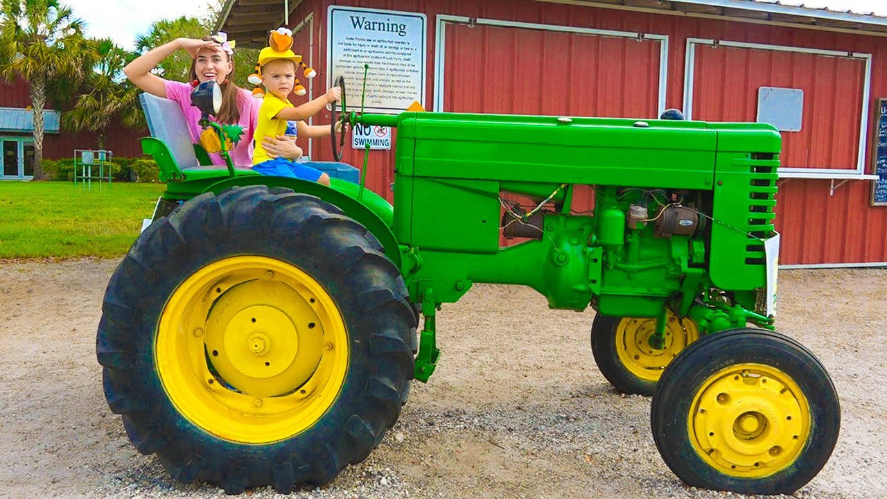 Vlad And Niki Chris And Mom In Tractor Background