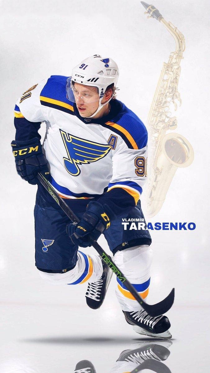 Vladimir Tarasenko Gliding While Holding Hockey Stick With Reflection And Saxophone Background