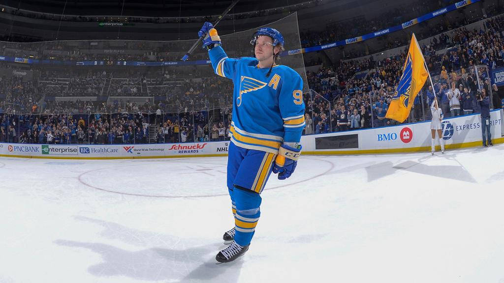 Vladimir Tarasenko Serious Expression Looking Up While Holding Hockey Stick Background