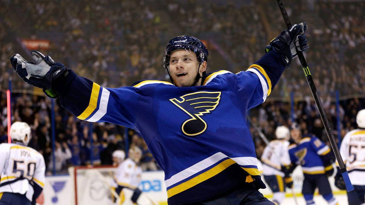 Vladimir Tarasenko Smiling With Open Arms In The Air Looking To The Right Background