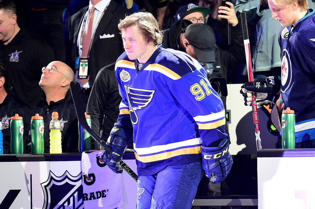 Vladimir Tarasenko Without Helmet Facing To The Right And Biting Lip Background