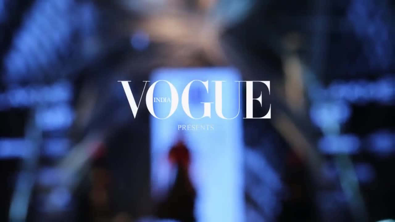 Vogue Logo Against A Black Background Background
