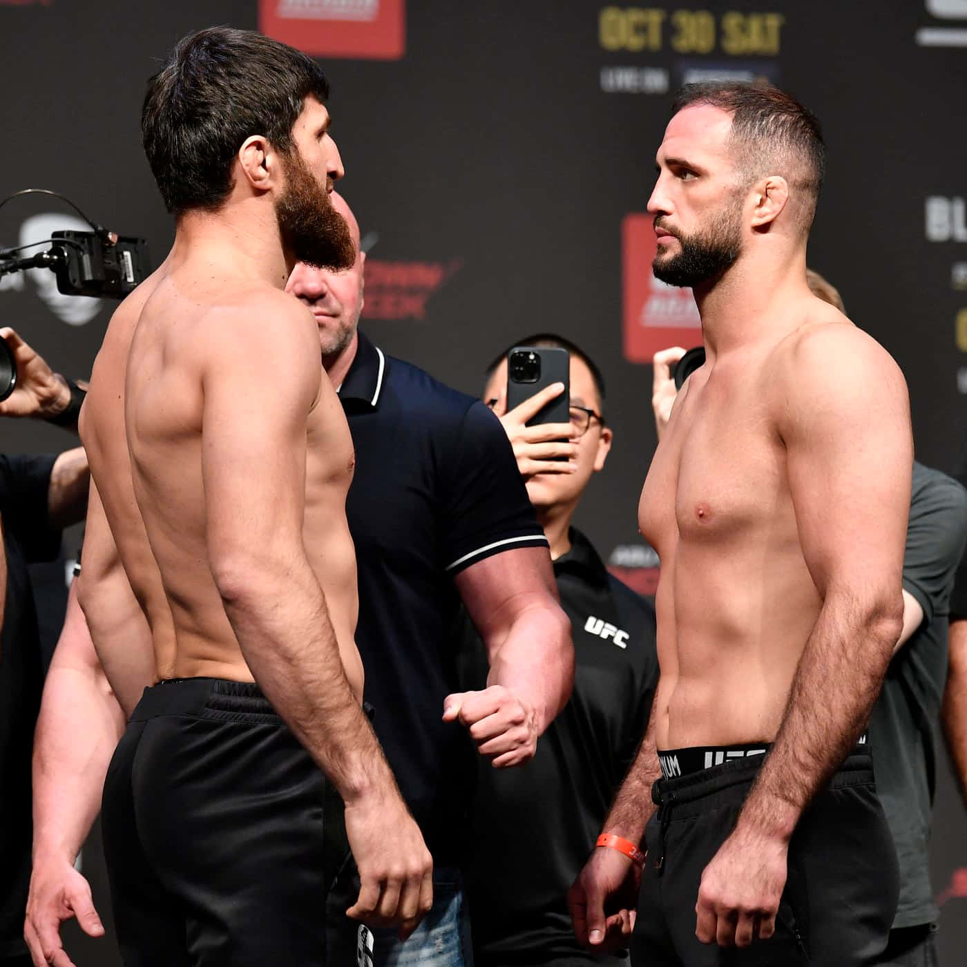 Volkan Oezdemir Magomed Ankalaev Face-off Background