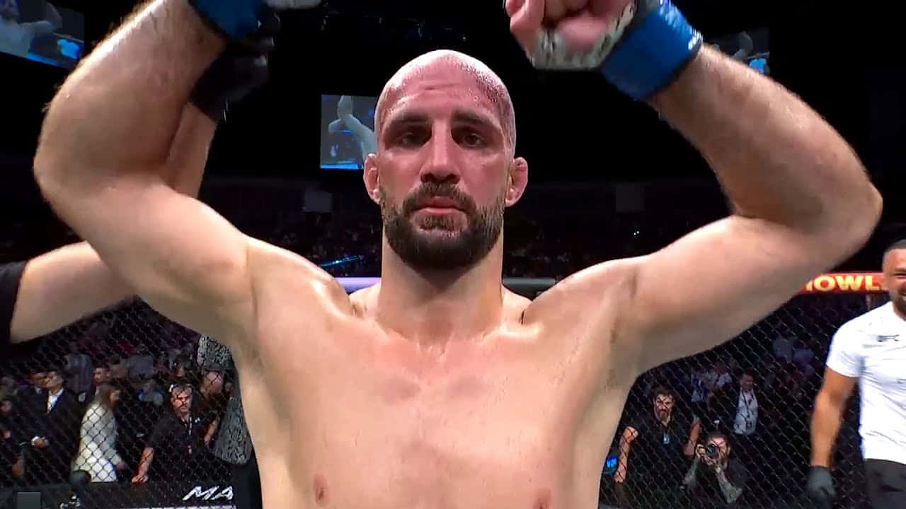Volkan Oezdemir Raising Arms Background