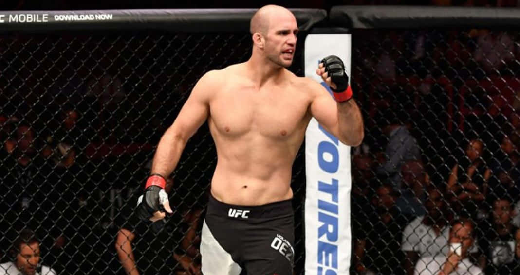 Volkan Oezdemir, The Mixed Martial Artist In Action During A Match Background