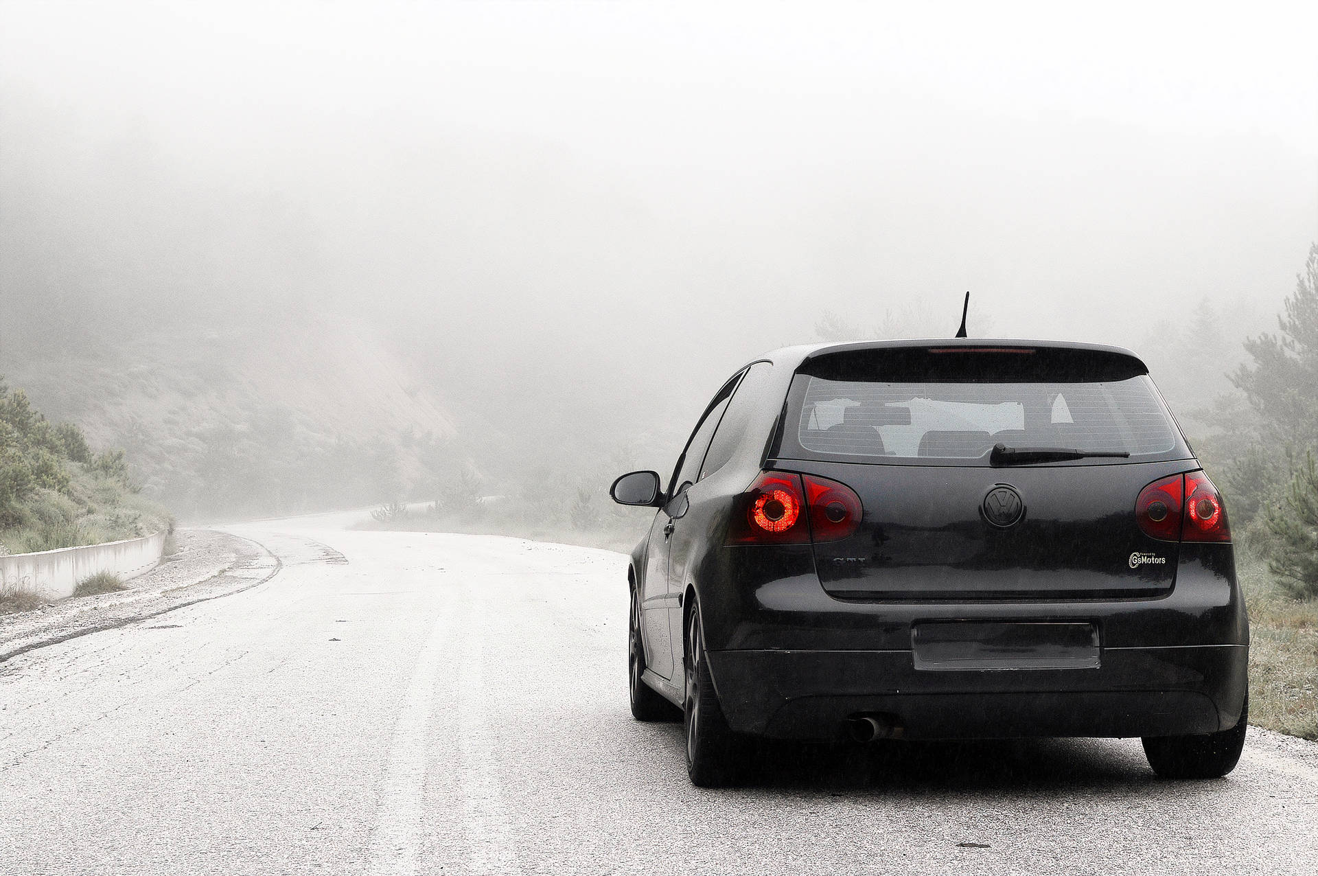 Volkswagen Golf Gti Driving Through Snow Background