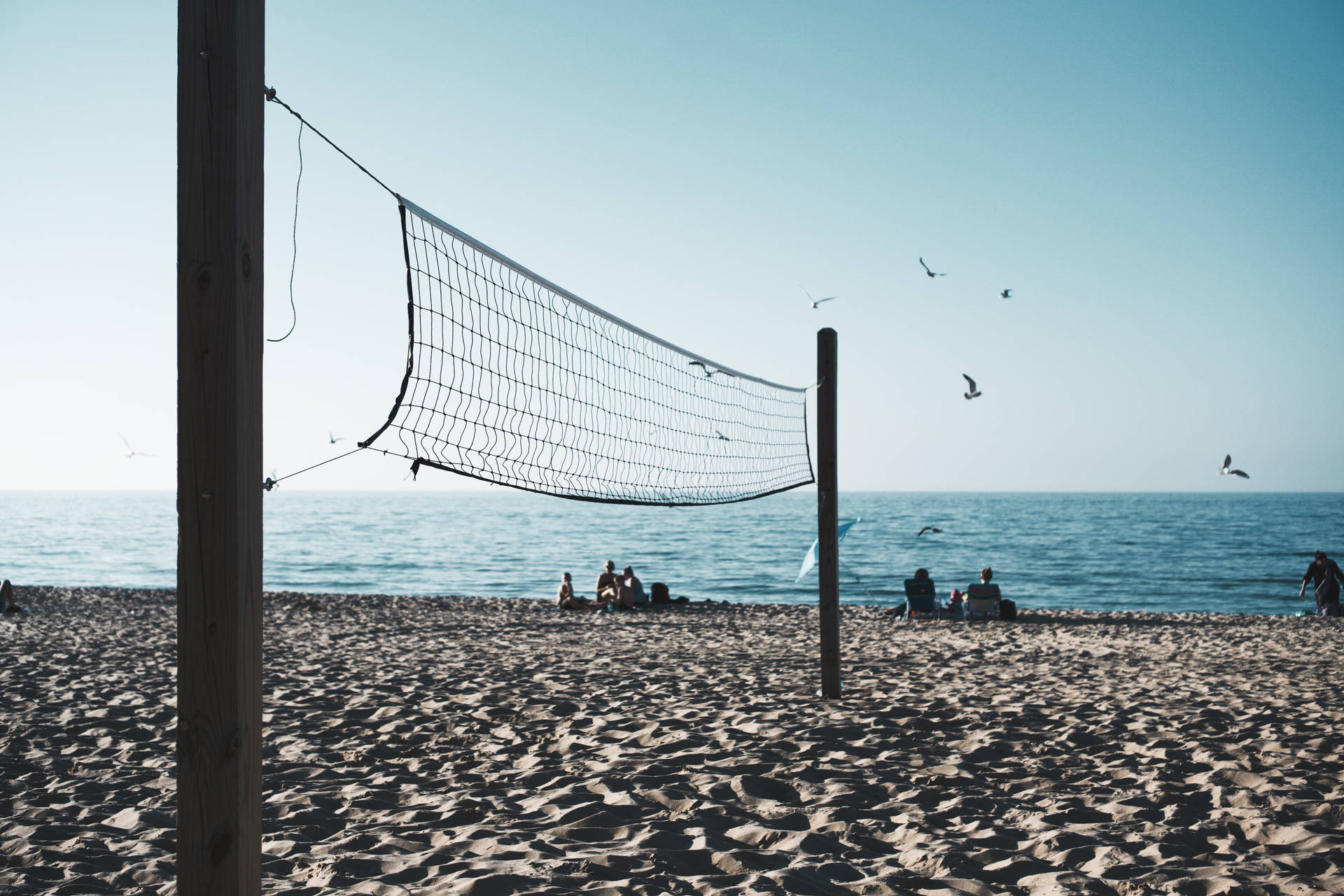 Volleyball Net On Shore Background